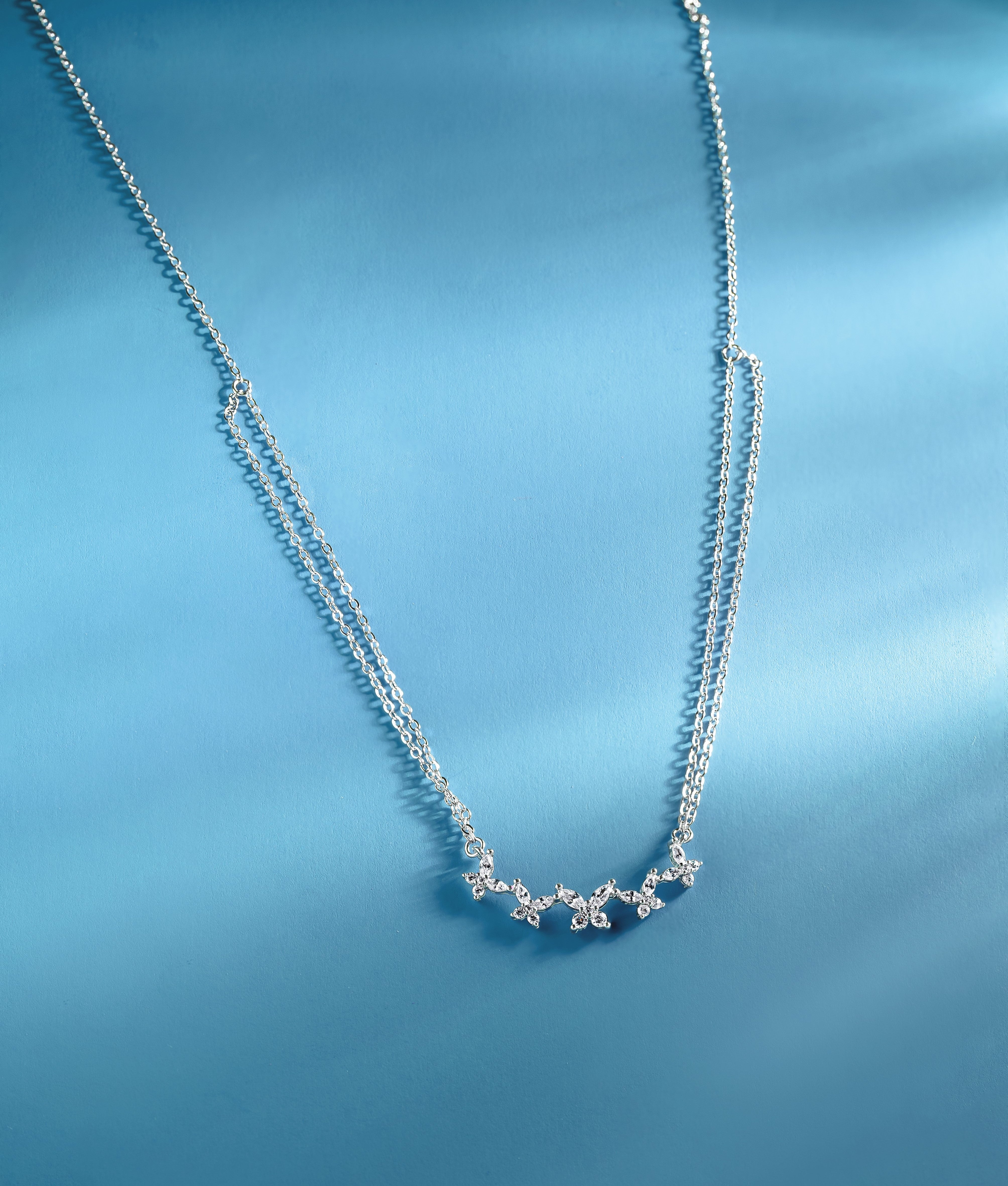 Dual chain butterfly stacked necklace