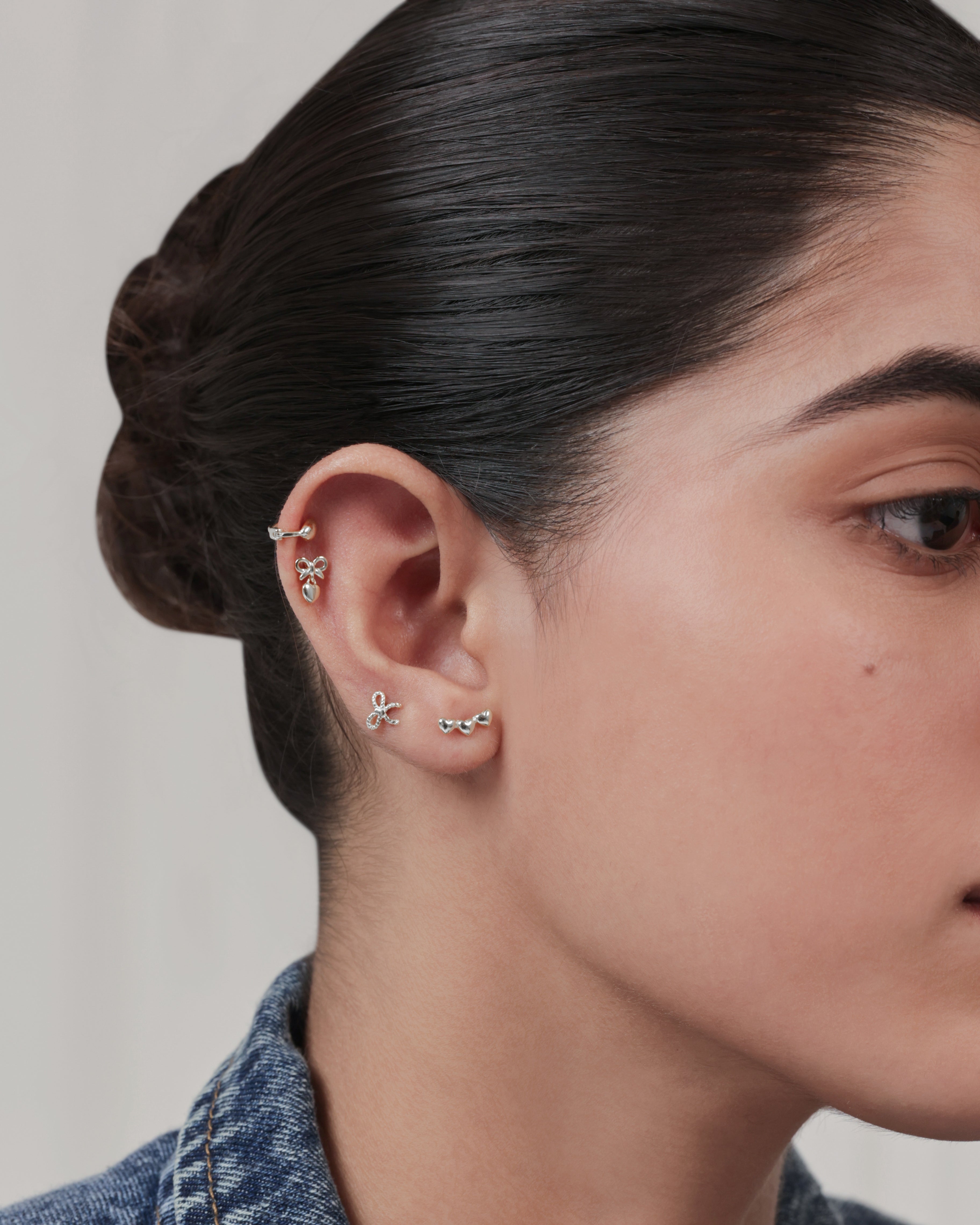 Twisted Bow Knot Stud – Rhodium Plated Flat Back Studs