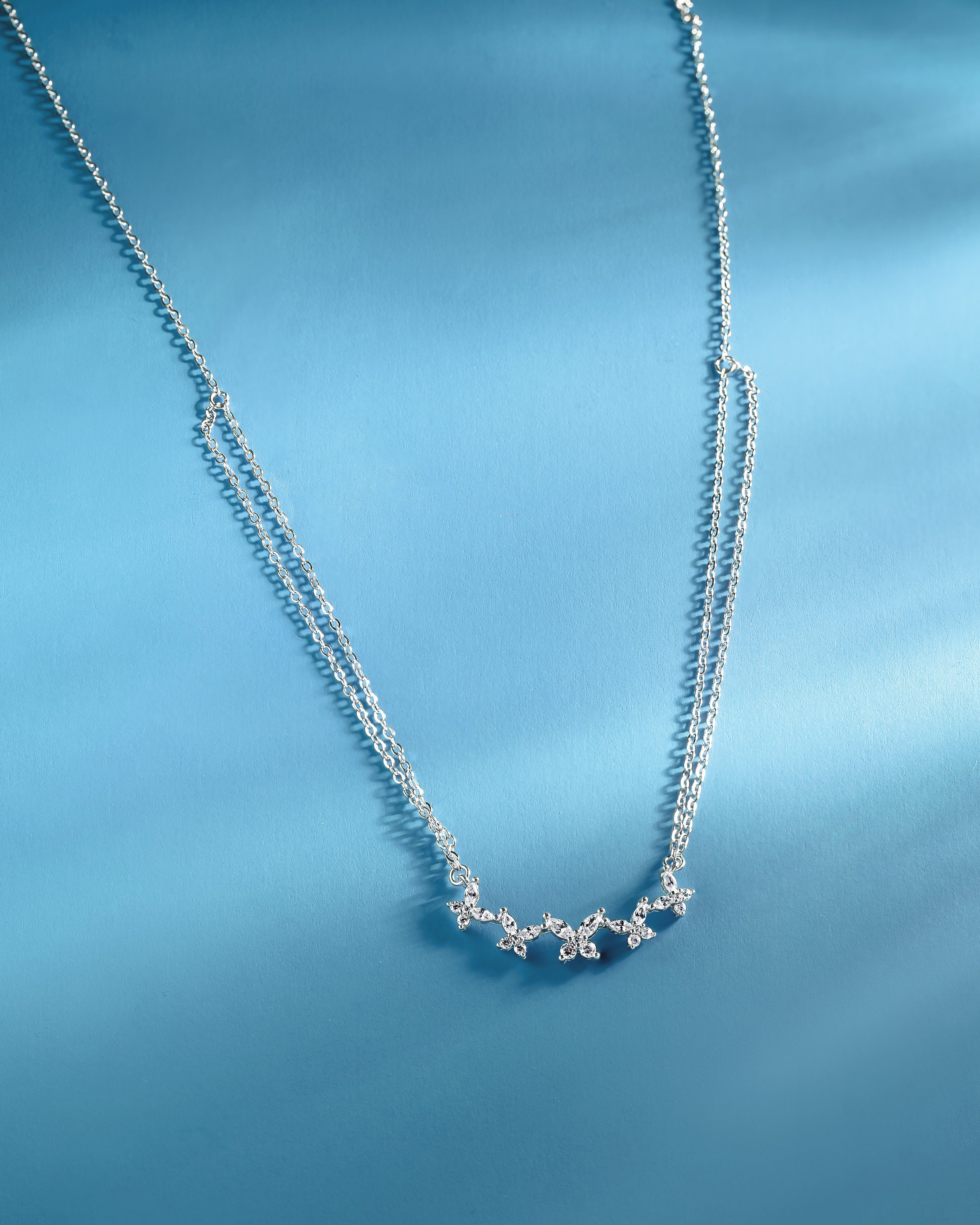 Dual chain butterfly stacked necklace
