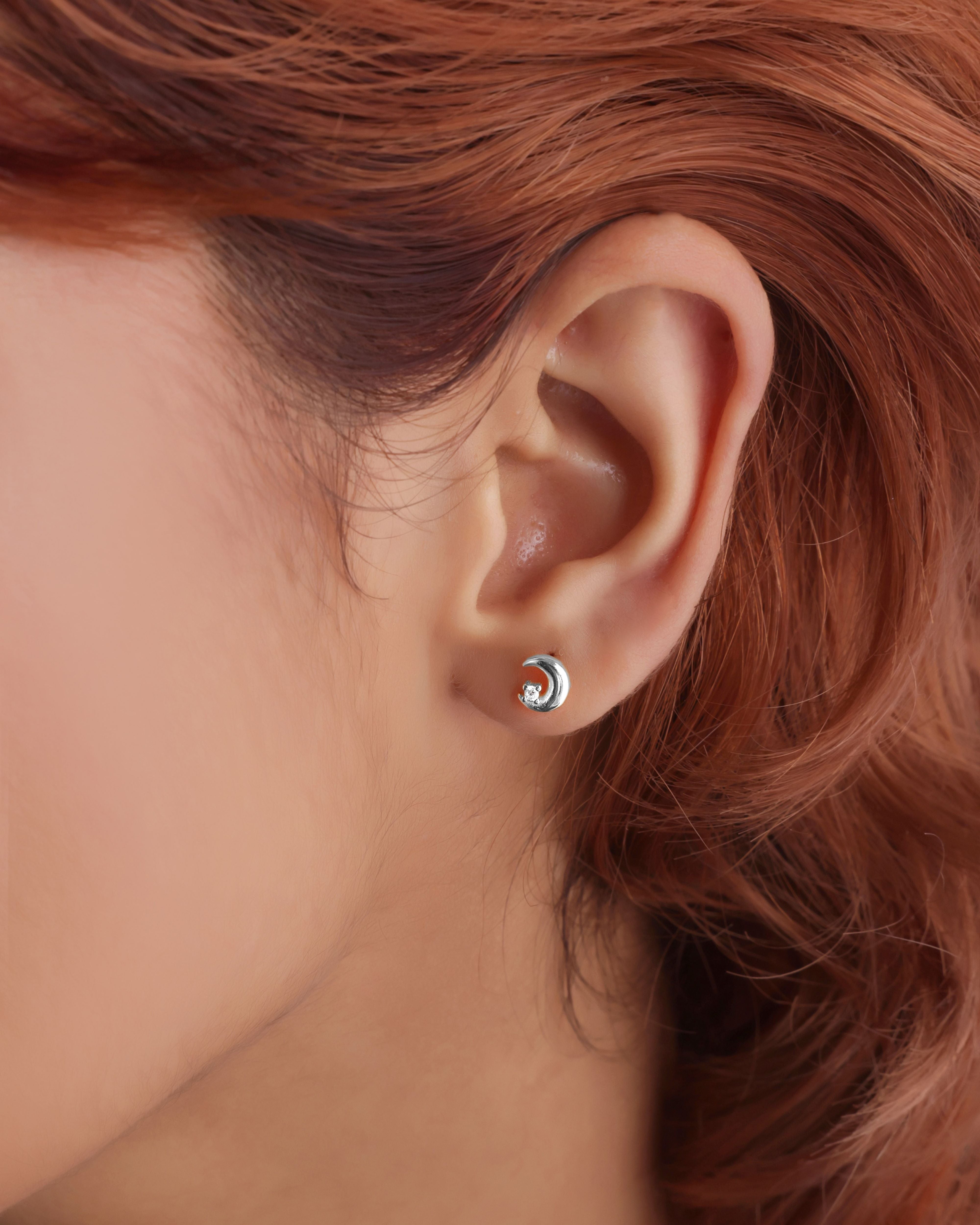 Mismatched Star with a moon combination stud earring - Pair