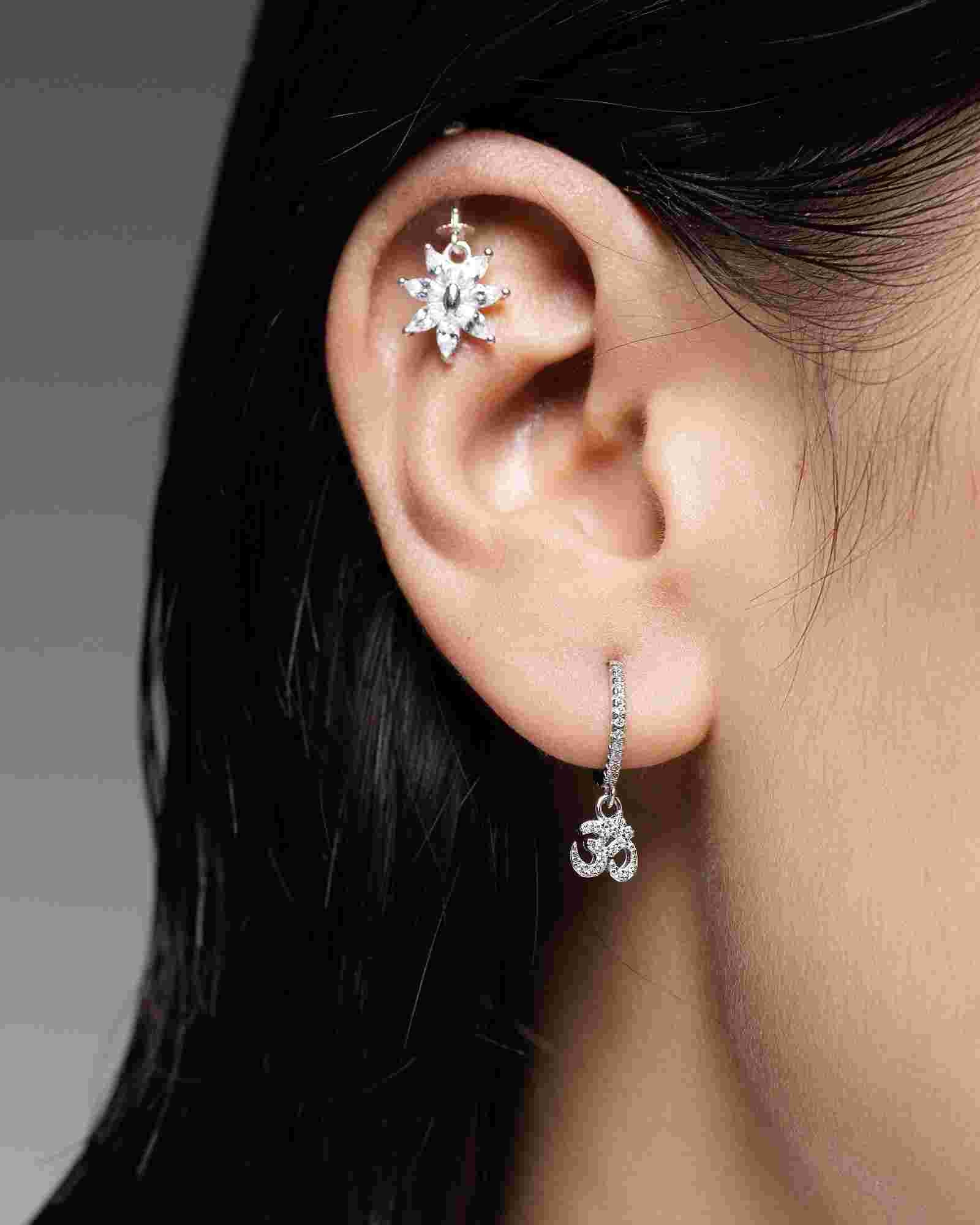 Helix Hanging - Marquise Flower Piercing Earring | Seven Stones features seven marquise-cut stones in a floral design, elegantly styled on the helix.